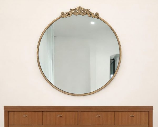 Homeroots - 32" Gold Crowned Top Iron Framed Accent Mirror - Image 1