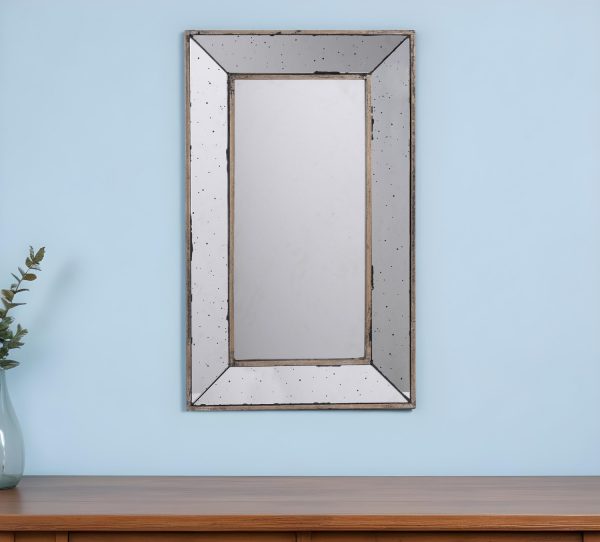 Homeroots - 24" Silver Framed Antiqued Accent Mirror - Image 1